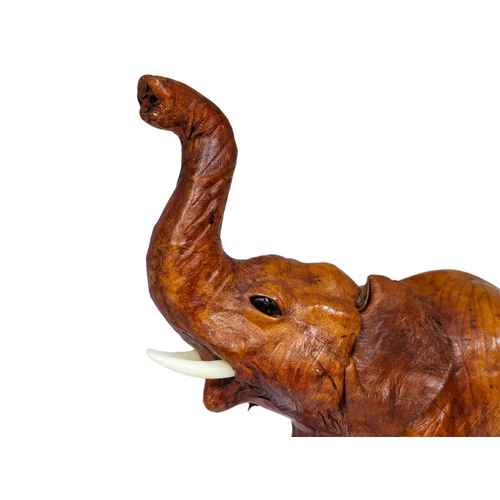 1616 - Brown leather wrapped elephant, in the style of Liberty, H 35cm