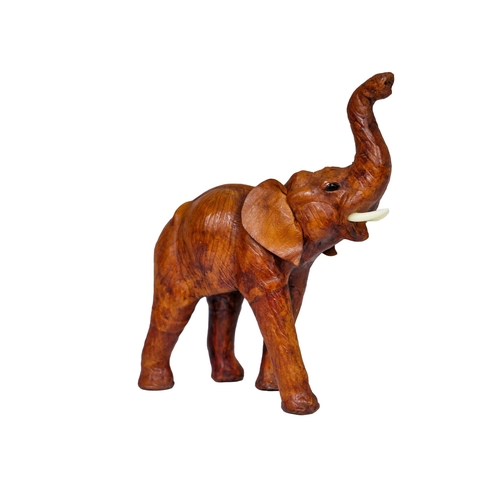 1616 - Brown leather wrapped elephant, in the style of Liberty, H 35cm