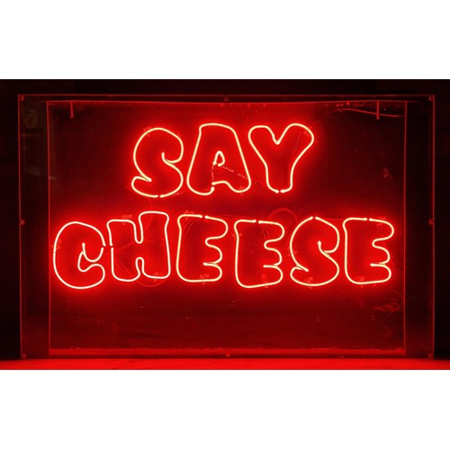 1031 - Vintage 1990's 'Say Cheese' red neon sign, working, 95cm x 65cm