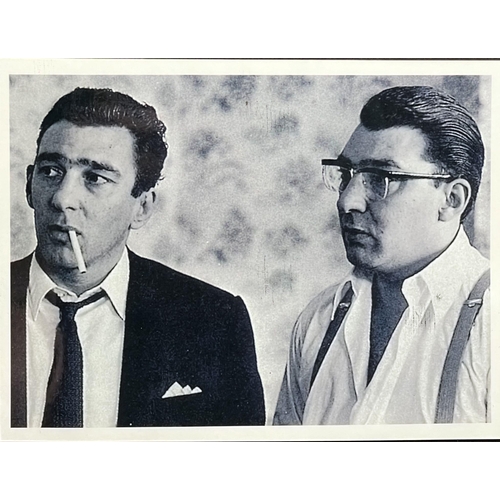 445 - Reggie Kray - Photo album with 32 black and white photograhs of the Kray twins, family and friends, ... 