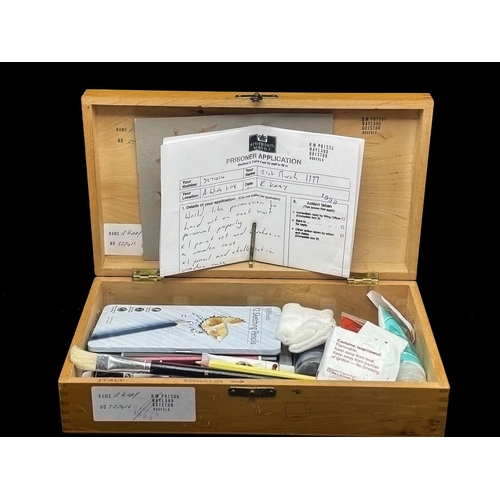 447 - Reggie Kray - A box full of art equipment with brushes, pencils and paints, with a drawing book and ... 