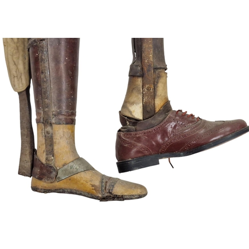 1630 - Two Victorian leather prosthetic legs