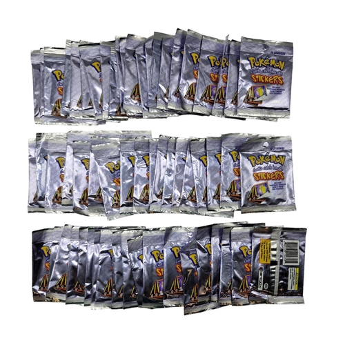 558 - Large collection of Pokemon 1999 1st edition sticker packs, sealed (61)