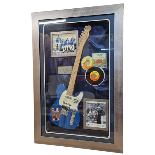 136 - The Beach Boys diorama - to include signed guitar, signed photograph and vinyl, 125cm x 85cm, framed