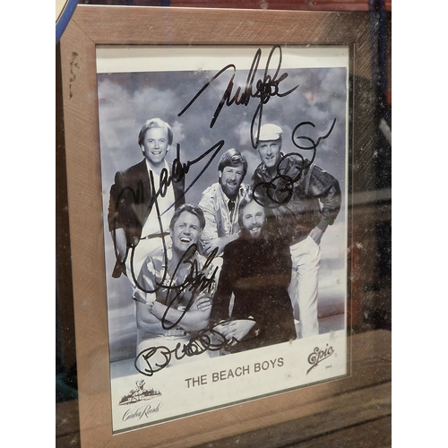 136 - The Beach Boys diorama - to include signed guitar, signed photograph and vinyl, 125cm x 85cm, framed