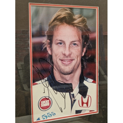 522 - Jenson Button Honda Racing team shirt and signed photograph, in large presentation frame with authen... 