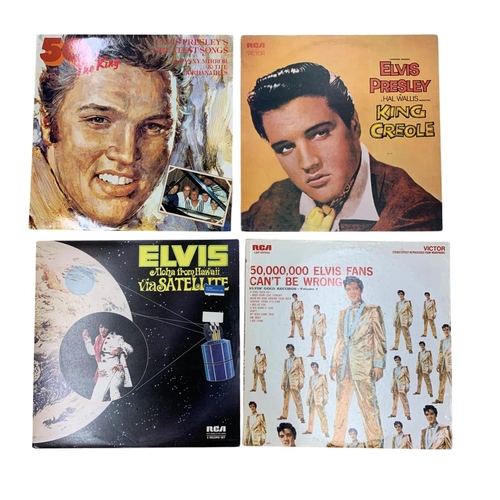 403 - Assortment of Elvis Presley related records to include singles, LP's and 78's, together with CD box ... 