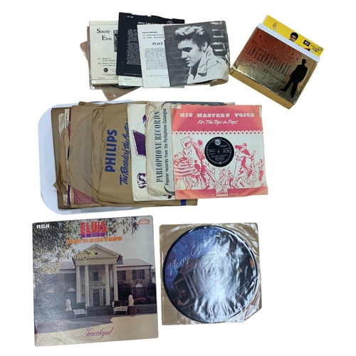 403 - Assortment of Elvis Presley related records to include singles, LP's and 78's, together with CD box ... 