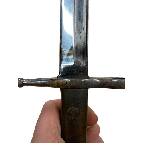 224 - Military bayonet held in original leather and steel sheath, marked with makers mark and numbered 'B5... 