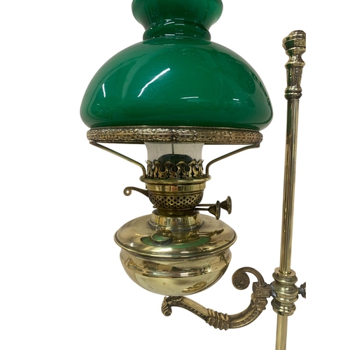 1117 - Antique brass rise and fall oil lamp with original green glass shade and chimney, H 72cm