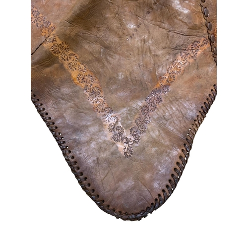 254 - Indian hand made brown leather elephants saddle, 110cm x 85cm