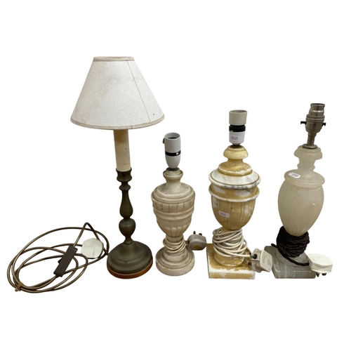 1125 - Quantity of mixed lighting to include alabaster table lamps, oil lamp and students candlestick examp... 