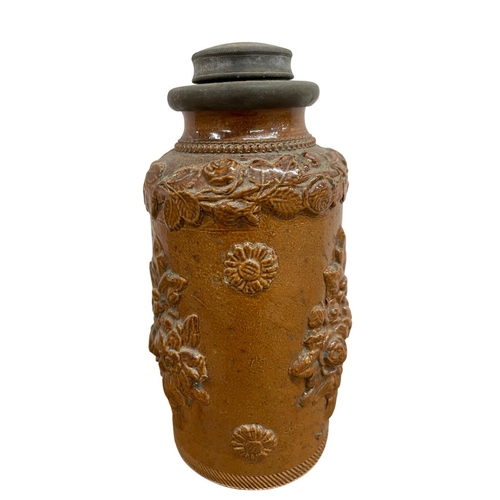 323 - 19th Century salt glazed tobacco jar, relief moulded, 19cm tall