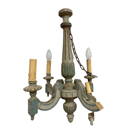 1128 - Mixed lighting to include a French wooden painted electrolier (a/f) and barley twist examples, talle... 