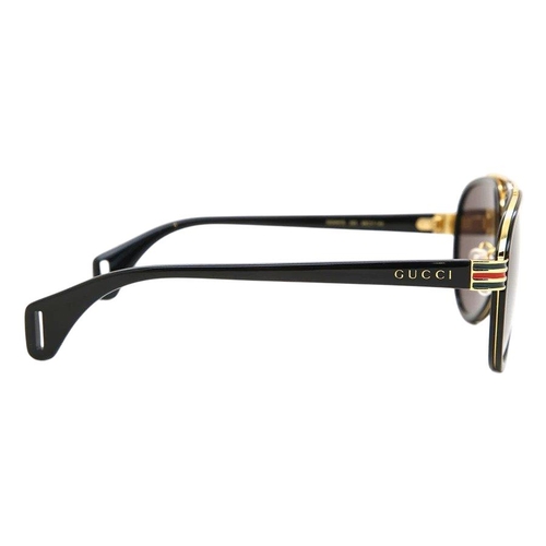 166 - A pair of Gucci Sunglasses for men with black and gold frame and brown lenses. Model number GG0447S.... 