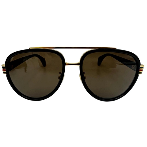 167 - A pair of Gucci Sunglasses for men with black and gold frame and brown lenses. Model number GG0447S.... 