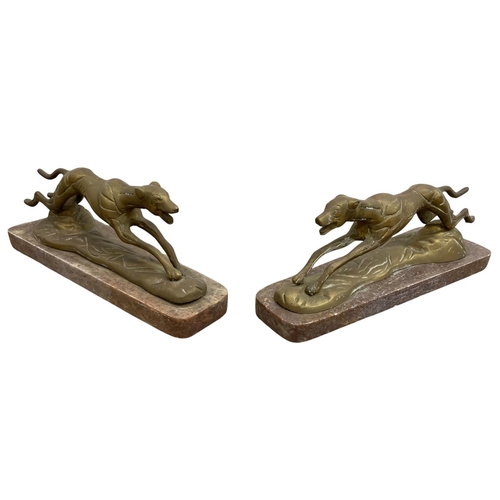 465 - Mixed quantity of metalware to include pair of greyhound bookends on marble base, brass pricket cand... 