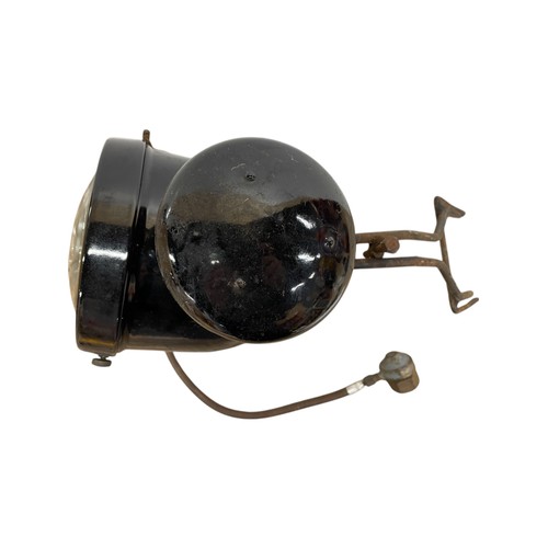 1140 - Black enamel carbide headlamp complete with bracket, diameter 16cm