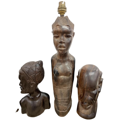 263 - Quantity of African hardwood collectables to include busts, table lamp, walking sticks, etc. (Lamp 4... 