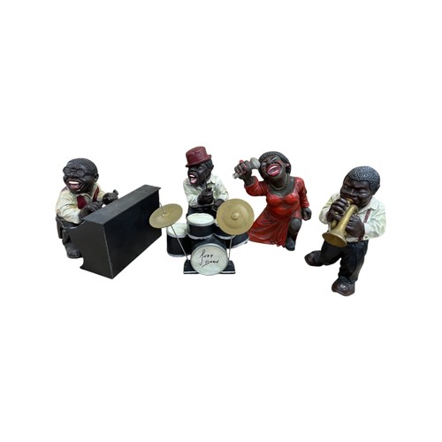 544 - Large resin four piece Jazz Band with drumset and piano, tallest 45cm