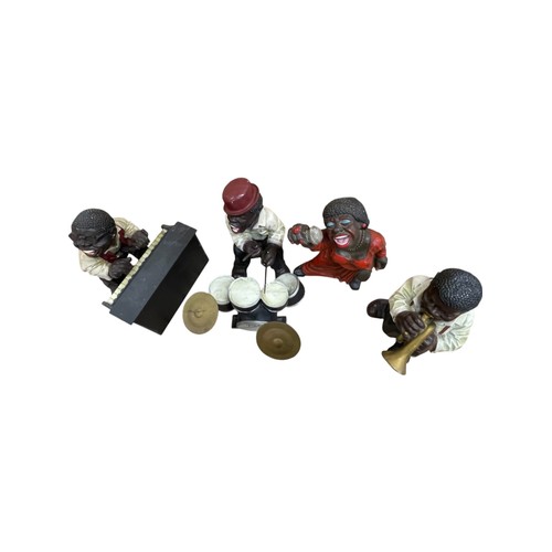 544 - Large resin four piece Jazz Band with drumset and piano, tallest 45cm