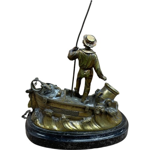 470 - 19th Century gilt bronze figural inkstand modelled as a fisherman on a small boat with waves splashi... 