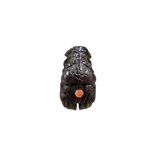 272 - 19th Century Japanese carved Netsuke in the form of a Slit Temple Drum, twin lion head handle, glass... 