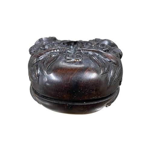 272 - 19th Century Japanese carved Netsuke in the form of a Slit Temple Drum, twin lion head handle, glass... 