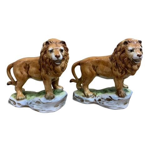 333 - Pair of hand painted Sitzendorf lion figures, stamped to base with mark and 'Lion Felis Leo', H 14cm... 