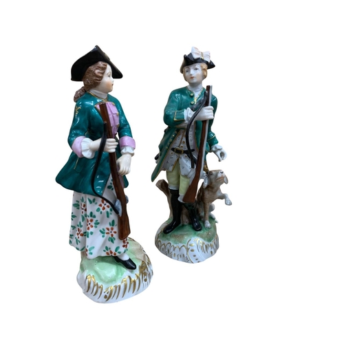 338 - Pair of Dresden Carl Thieme porcelain hunting themed figures with an additional flower and egg picki... 