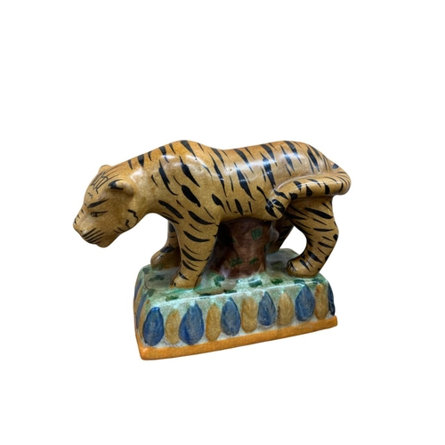 339 - Pair of hand painted Staffordshire tiger figures atop naturalistic and leaf bordered base, H 12cm x ... 