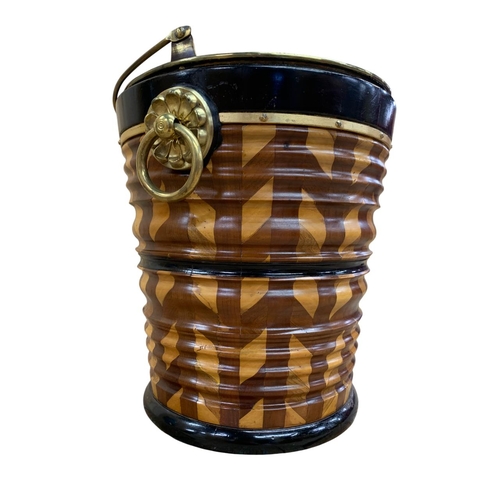 418 - 19th century Irish peat bucket with Herringbone style liner, having twin floral handles and original... 