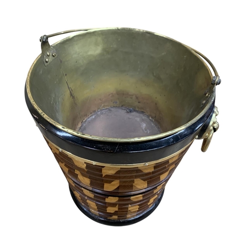 418 - 19th century Irish peat bucket with Herringbone style liner, having twin floral handles and original... 