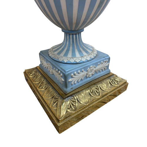 360 - Victorian pale blue Jasperware and brass table lamp of urn form, decorated with classical maiderns, ... 