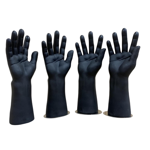 554 - Two pairs of contemporary sculptural male mannequin hands atop magnetic bases, H 30cm