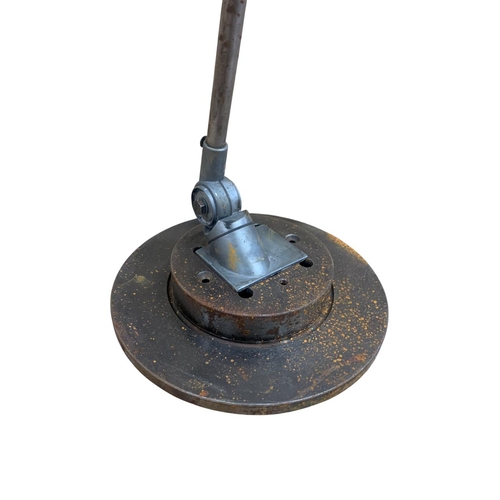 1145 - Vintage Engineers industrial style articulated machinist lamp on circular base, H 52cm