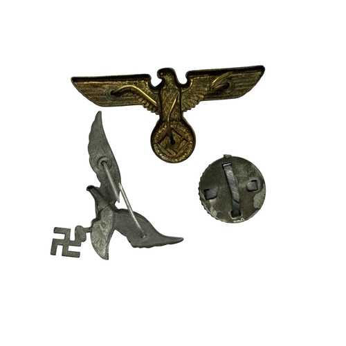 233 - Quantity of German WWII badges to include NSDAP visor cap eagle, German WWII tricolour cap cockade a... 