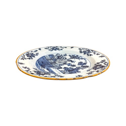 371 - 18th Century Dutch Delft blue and white circular dish with central Chinese garden scene and repeatin... 