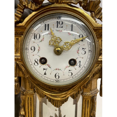 203 - French 19th century gilt bronze, spelter and white marble figural mantle clock, the clock body surmo... 