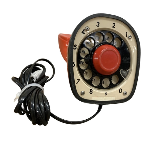 566 - Ericofon cobra 1956 LM Ericsson red rotary dial telephone, H 21cm