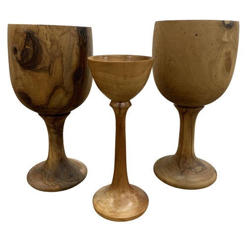 425 - Collection of mixed treen to include a large yew wood goblet with an additional yew wood example and... 