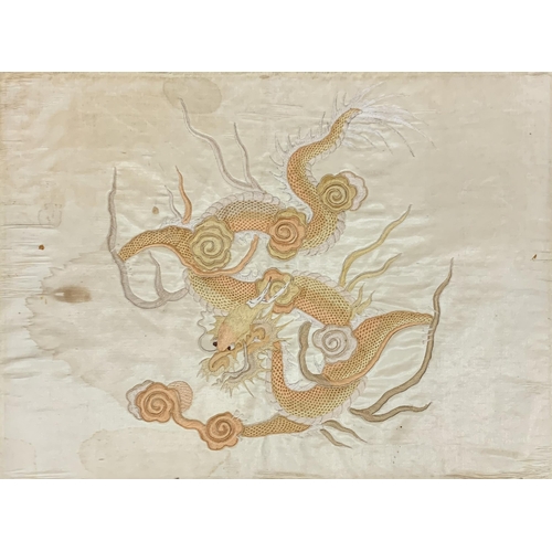 1536 - Pair of Chinese embroidered rectangular silk panels depicting dragons, on cream ground, 55cm x 38cm,... 