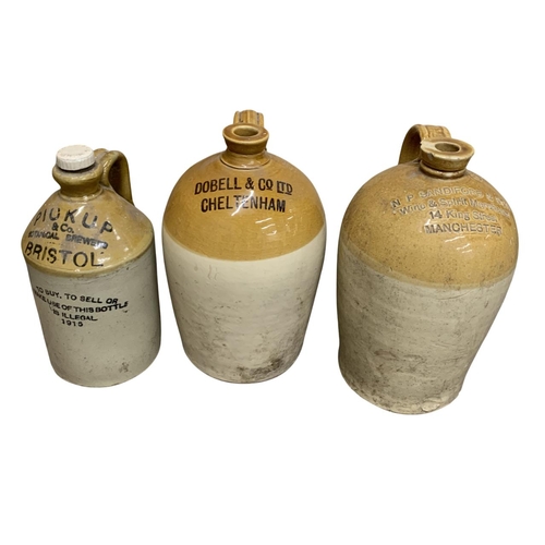 1028 - Collection of antique brown glazed stoneware beer and cider flagons to include Perry Bros, R. White ... 