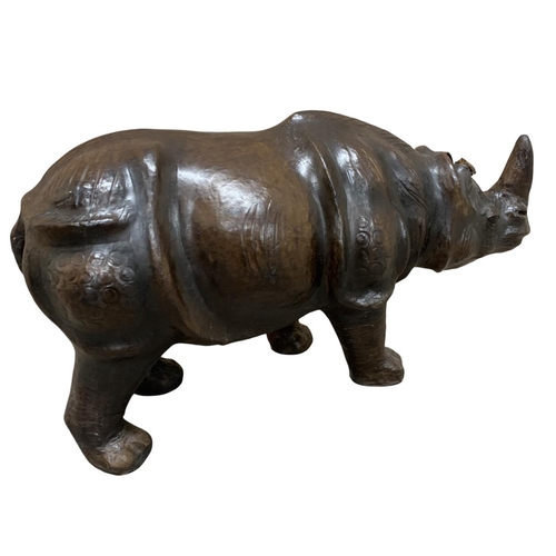 572 - Liberty of London Omersa leather rhinoceros footstool with inset glass eyes, original 1930's example... 