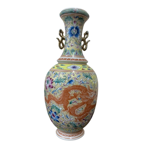 310 - Chinese porcelain twin handled vase, baluster form, enamelled with scolled flowers and with painted ... 