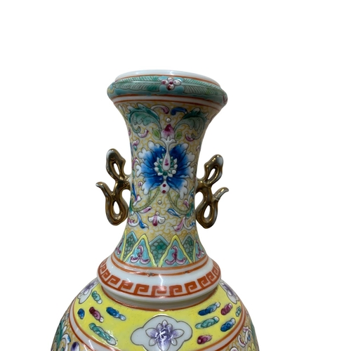 310 - Chinese porcelain twin handled vase, baluster form, enamelled with scolled flowers and with painted ... 