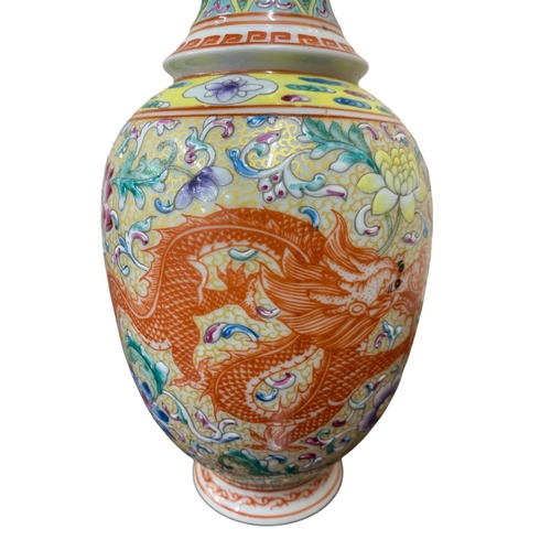 310 - Chinese porcelain twin handled vase, baluster form, enamelled with scolled flowers and with painted ... 