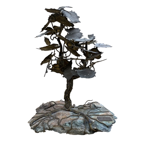 499 - Albert Guibara (b, 1944) Bronze tree sculpture with twisted trunk and spreading roots, raised atop n... 