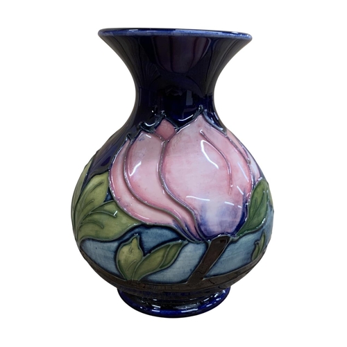 401 - Moorcroft Pottery Magnolia pattern floral vase, stamped to base, H 13cm