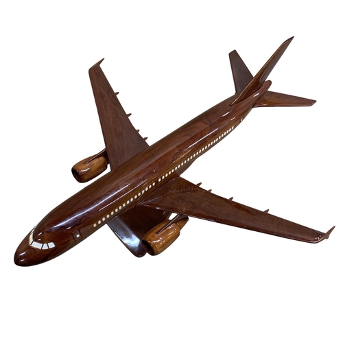 440 - Indian Rosewood desktop Airbus ACJ aeroplane on display stand, having intricate bone inlay to window... 